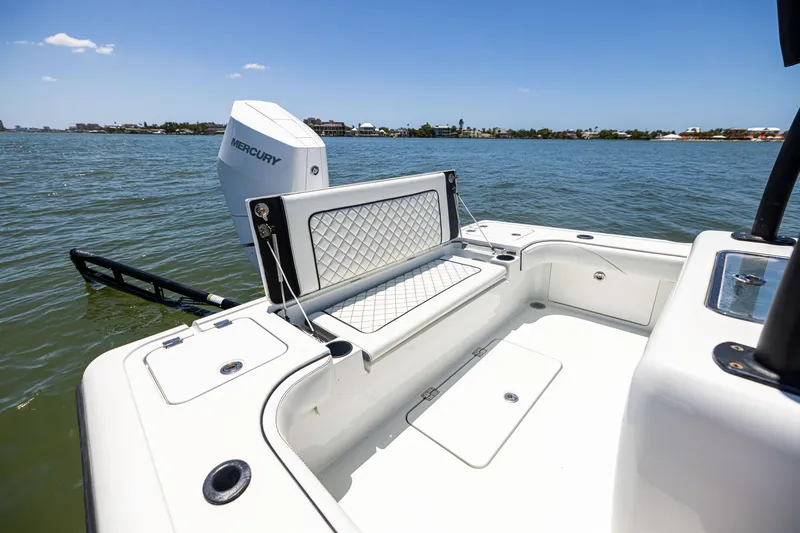 Slide: The Image of 2020 Barker Boatworks 26 with Mercury engine on calm water. - 10