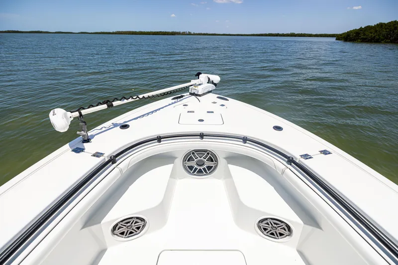 Slide: The Image of Barker Boatworks 26, 2020 model, bow view on calm water with trolling motor. - 25