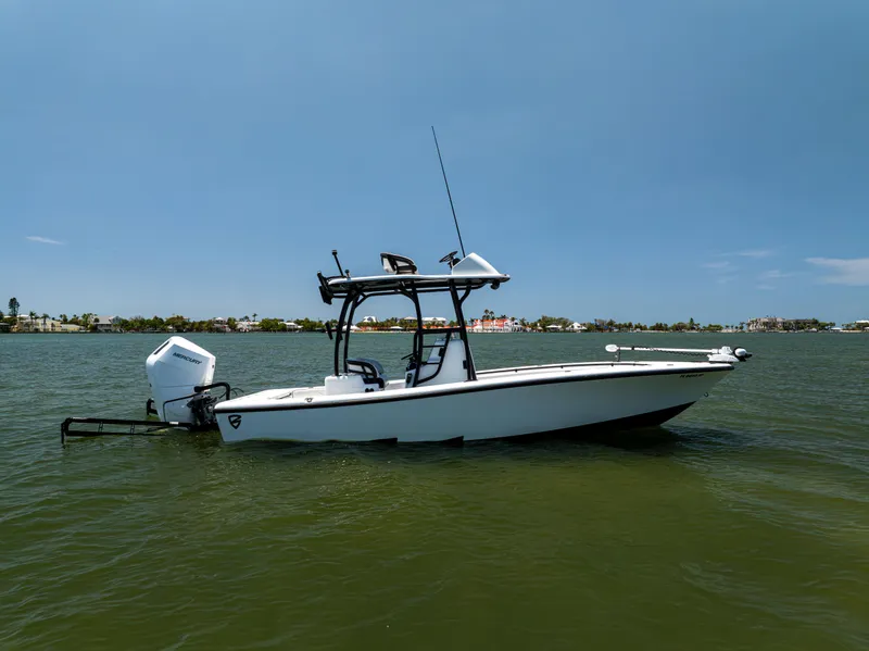 Slide: The Image of 2020 Barker Boatworks 26 on calm water, featuring sleek design and modern equipment. - 3