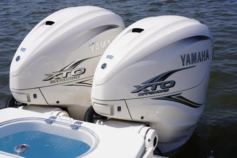 Slide: The Image of Twin Yamaha XTO Offshore engines on a 2020 Cobia 350 Center Console boat. - 25