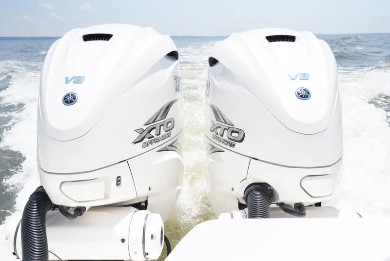 Slide: The Image of Twin Yamaha XTO V8 outboard engines on a 2020 Cobia 350 Center Console boat. - 26