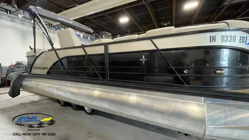 Slide: The Image of 2020 Berkshire STS Entertainment 25 pontoon boat in showroom, Marine Center Indiana. - 15