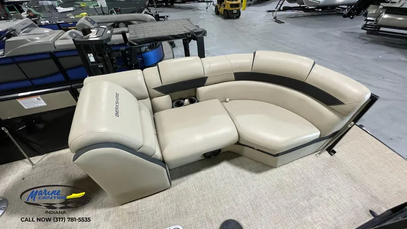 Slide: The Image of Berkshire STS Entertainment 25 boat seating, beige and black, displayed at Marine Center Indiana. - 17