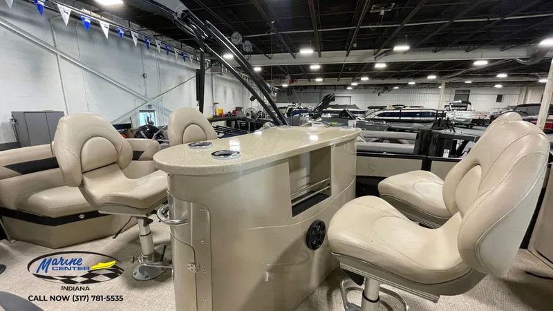 Slide: The Image of 2020 Berkshire STS Entertainment 25 boat interior with plush seating and bar area. - 3