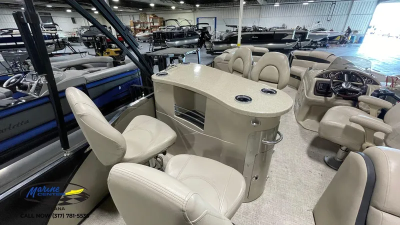 Slide: The Image of Interior of 2020 Berkshire STS Entertainment 25 pontoon boat with seating and helm. - 6