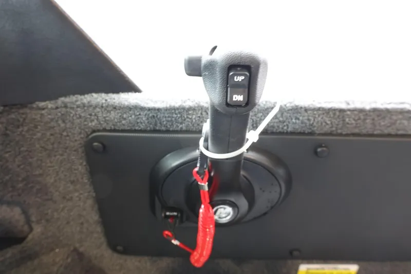 Slide: The Image of Control lever in 2025 Lund 1875 Impact XS Sport boat interior. - 19