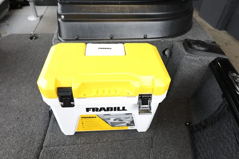 Slide: The Image of Yellow Frabill storage box on 2025 Lund 1875 Impact XS Sport boat interior. - 33