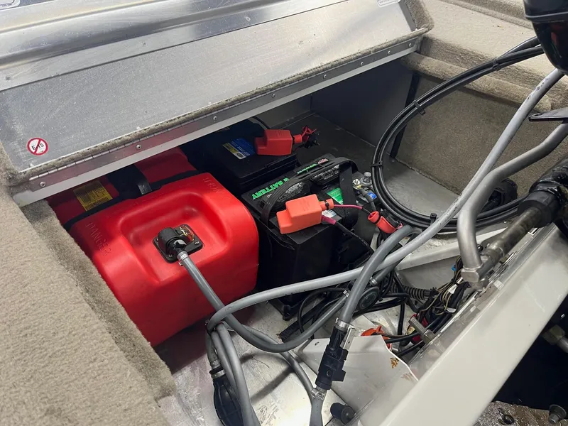 Slide: The Image of 2022 Tracker Bass Tracker Classic XL boat battery and fuel tank compartment. - 3