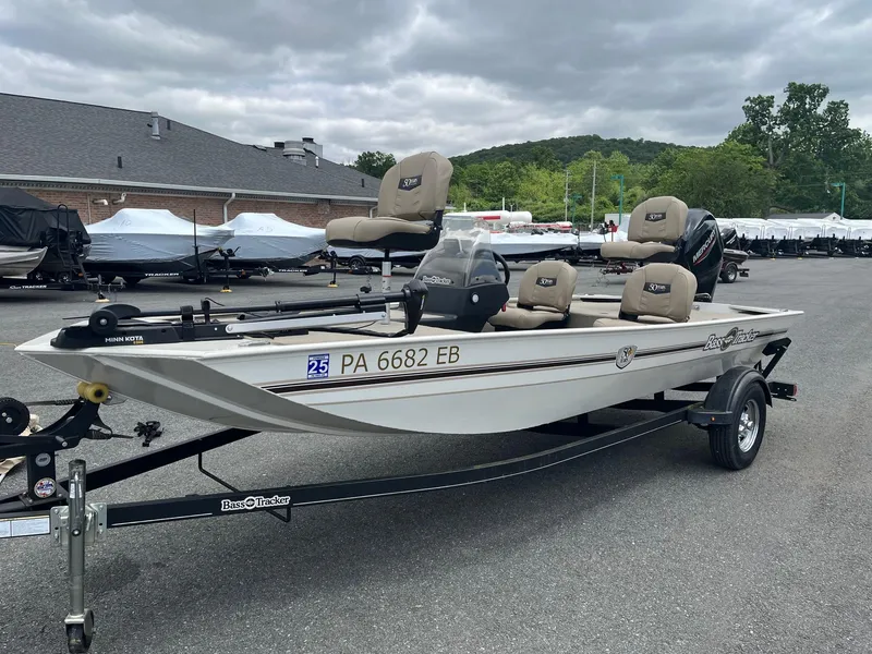 Slide: The Image of 2022 Tracker Bass Tracker Classic XL boat on trailer, parked outdoors. - 5