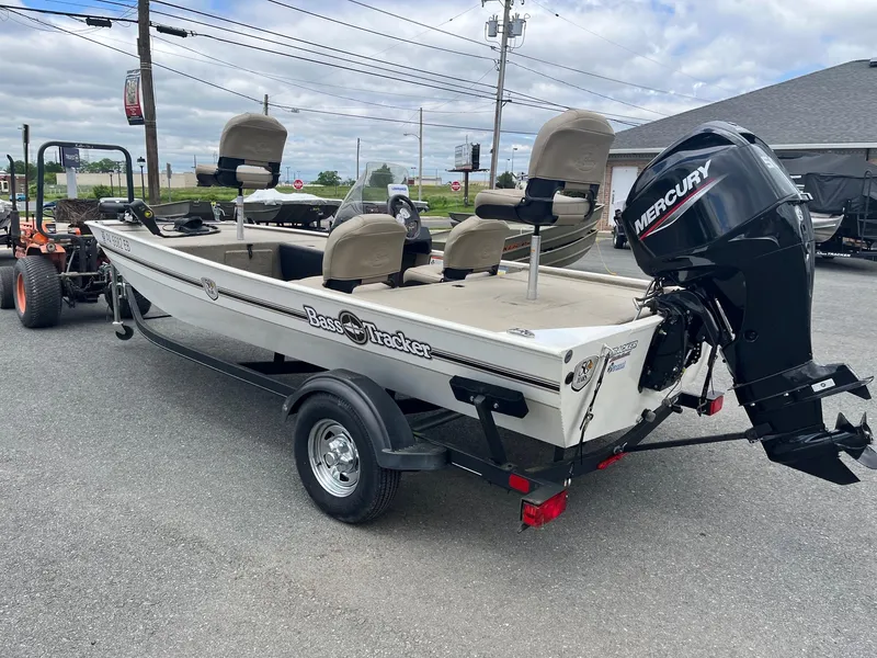 Slide: The Image of 2022 Tracker Bass Tracker Classic XL boat with Mercury engine on trailer. - 6