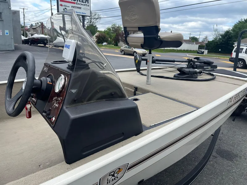 Slide: The Image of 2022 Tracker Bass Tracker Classic XL boat with steering console and seating. - 9
