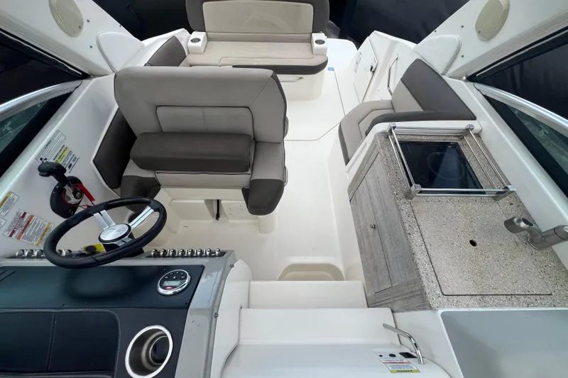 Slide: The Image of 2014 Sea Ray 260 Sundancer bathroom with sink and dual toilets. - 26