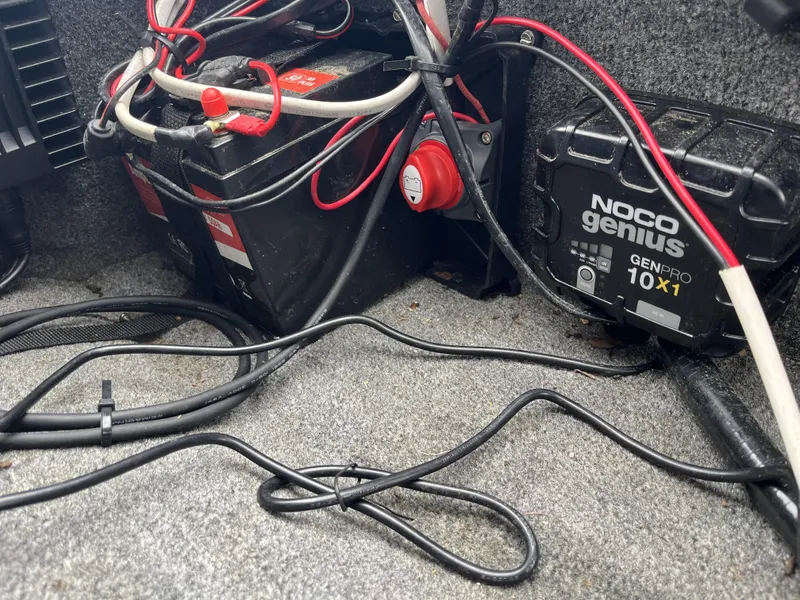 Slide: The Image of 2012 Phoenix 921 PRO XP battery setup with NOCO Genius GENPRO 10X1 charger. - 22