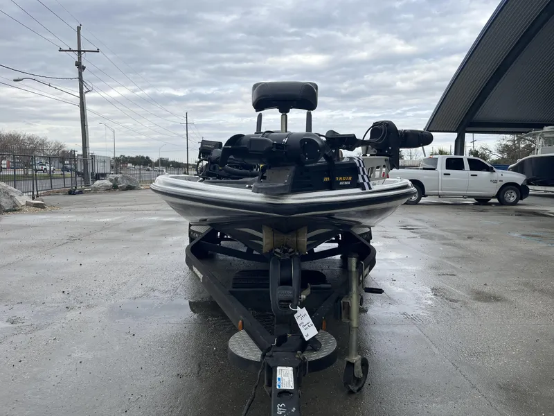 Slide: The Image of 2012 Phoenix 921 PRO XP boat on trailer in parking lot, overcast sky. - 3