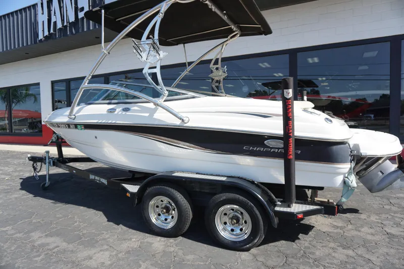 Slide: The Image of 2006 Chaparral SSi 190 boat on trailer, parked outside dealership. - 17
