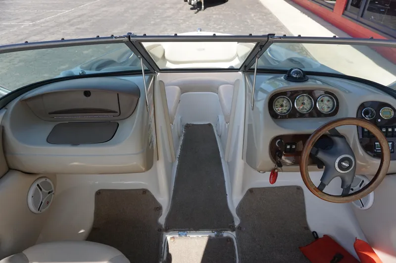 Slide: The Image of 2006 Chaparral SSi 190 boat interior with steering wheel and dashboard gauges. - 7