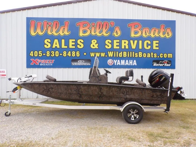 Slide: The Image of 2025 Xpress H20BAY boat on trailer at Wild Bill's Boats dealership. - 22