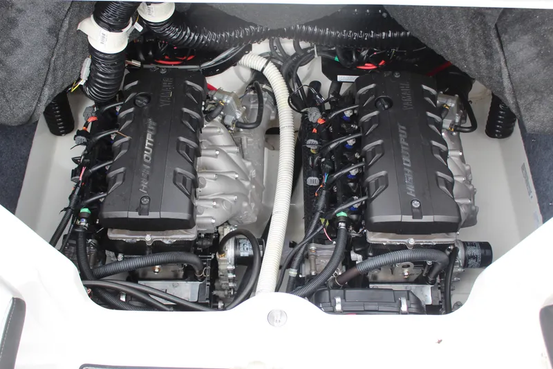 Slide: The Image of 2019 Yamaha Boats 242 Limited S engine compartment with dual high-output engines. - 17