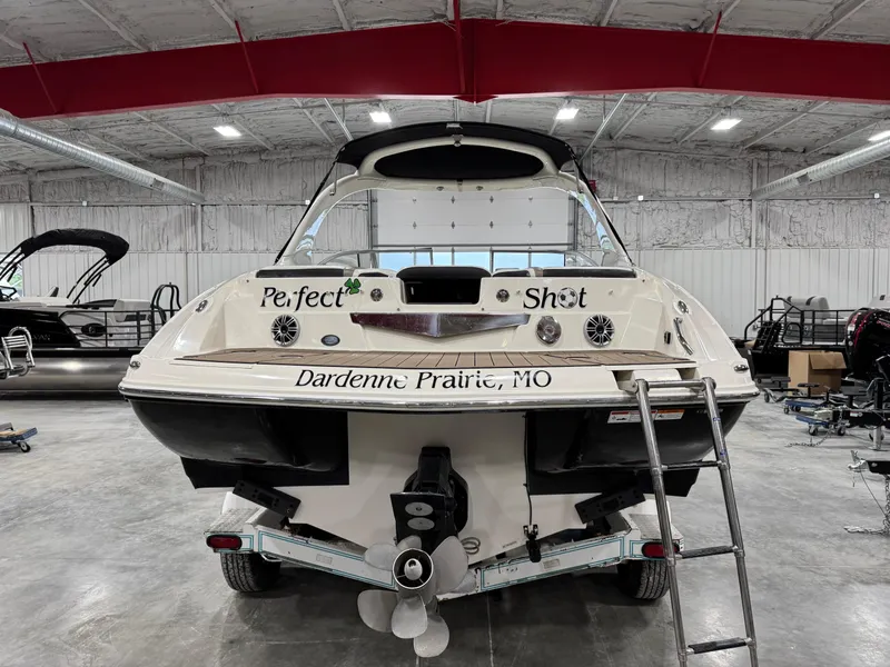 Slide: The Image of 2012 Larson LXi 288 boat in a warehouse, labeled "Perfect Shot," Dardenne Prairie, MO. - 5