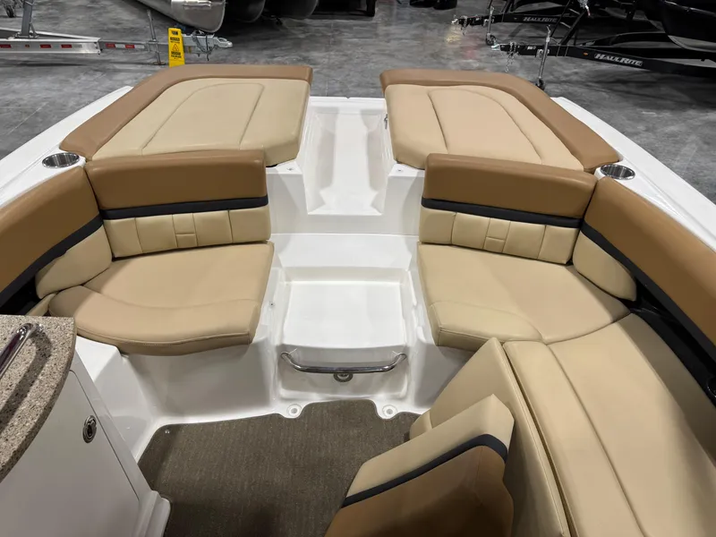 Slide: The Image of Interior view of 2012 Sea Ray 250 SLX boat with tan seating. - 8