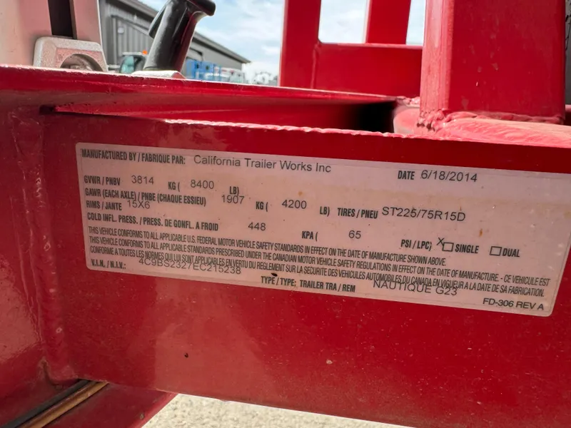 Slide: The Image of Label on red trailer by California Trailer Works, dated 6/18/2014, for Nautique G23. - 15