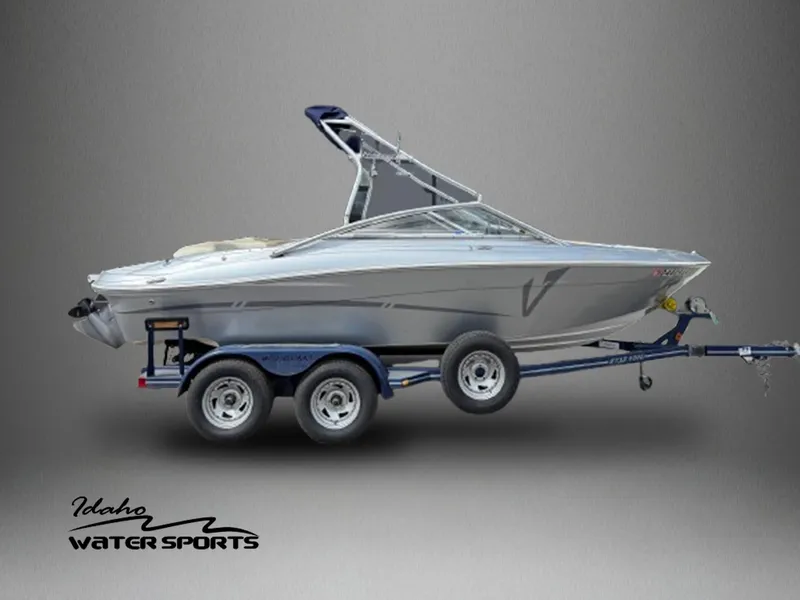 Slide: The Image of 2006 Four Winns Horizon boat on trailer, Idaho Water Sports logo. - 1