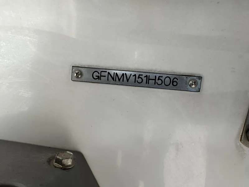 Slide: The Image of 2006 Four Winns Horizon boat identification plate with serial number GFNMV151H506. - 12