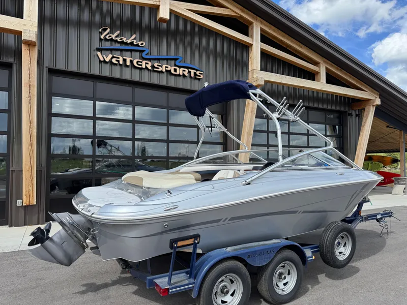 Slide: The Image of 2006 Four Winns Horizon boat on trailer at Idaho Water Sports. - 4