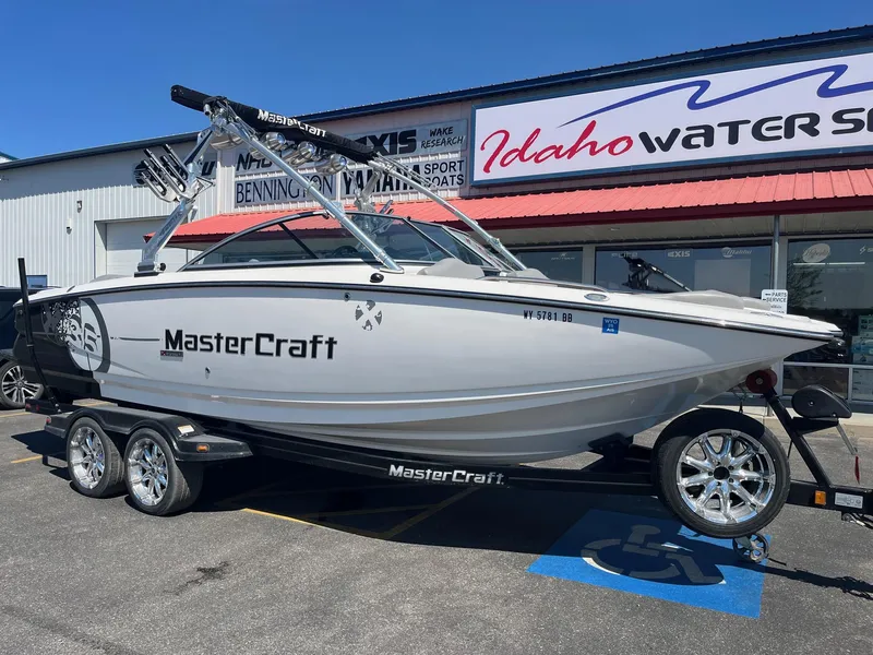 Slide: The Image of 2008 MasterCraft X35 boat on trailer at Idaho Water Sports dealership. - 14