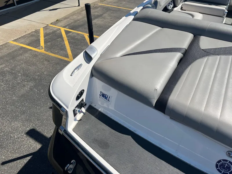 Slide: The Image of 2008 MasterCraft X35 boat with gray seating and Swell Wakesurf logo. - 19