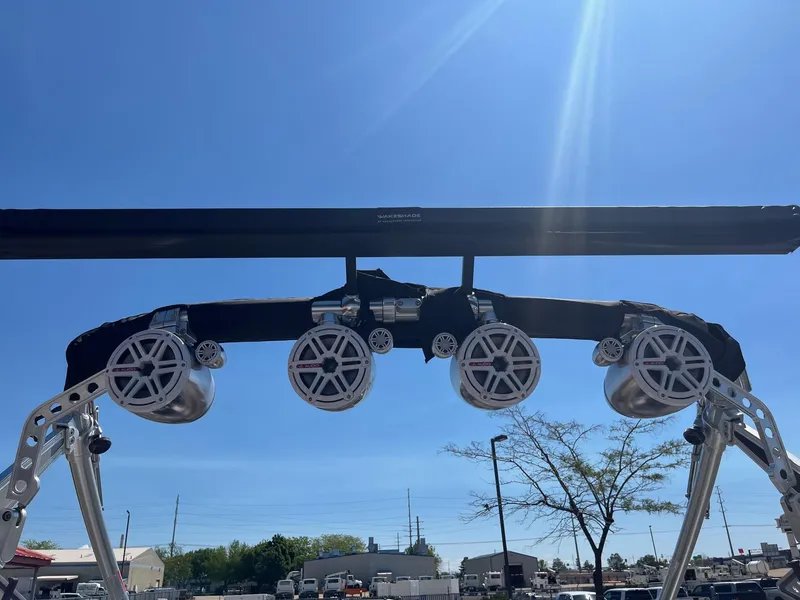 Slide: The Image of 2008 MasterCraft X35 boat speakers and wakeboard tower under clear blue sky. - 37