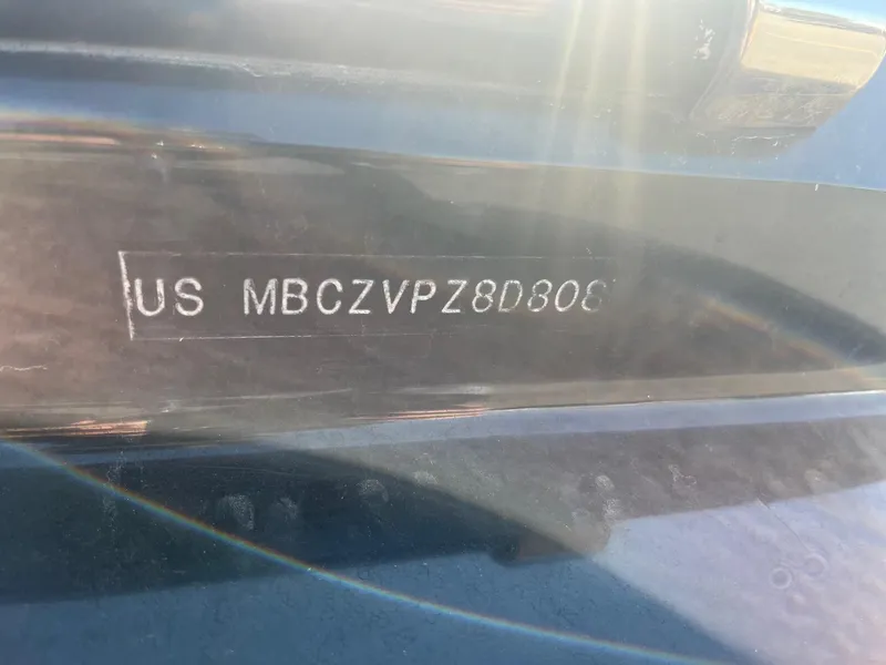 Slide: The Image of Close-up of a 2008 MasterCraft X35 boat hull identification number. - 42