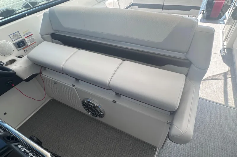 Slide: The Image of 2023 Formula 380 Super Sport Crossover OB boat interior seating area. - 13