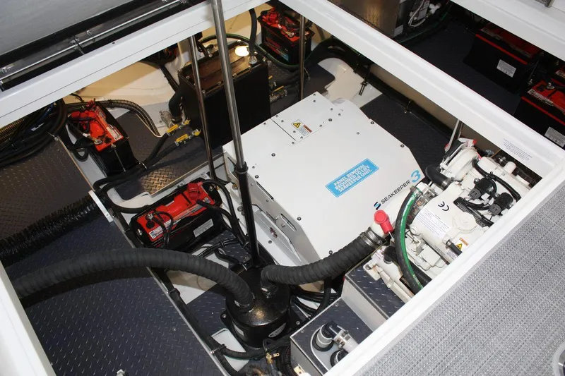 Slide: The Image of Engine compartment of 2023 Formula 380 Super Sport Crossover OB, showcasing mechanical components. - 21