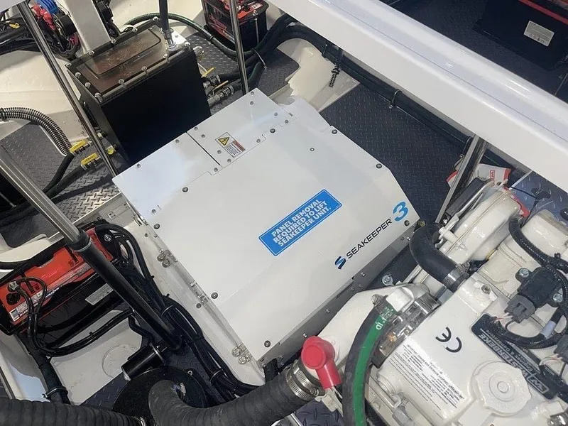 Slide: The Image of 2023 Formula 380 Super Sport Crossover OB engine compartment with Seakeeper 3 stabilizer. - 22
