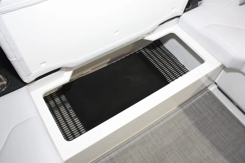 Slide: The Image of 2023 Formula 380 Super Sport Crossover OB storage compartment with open lid, showcasing interior space. - 28