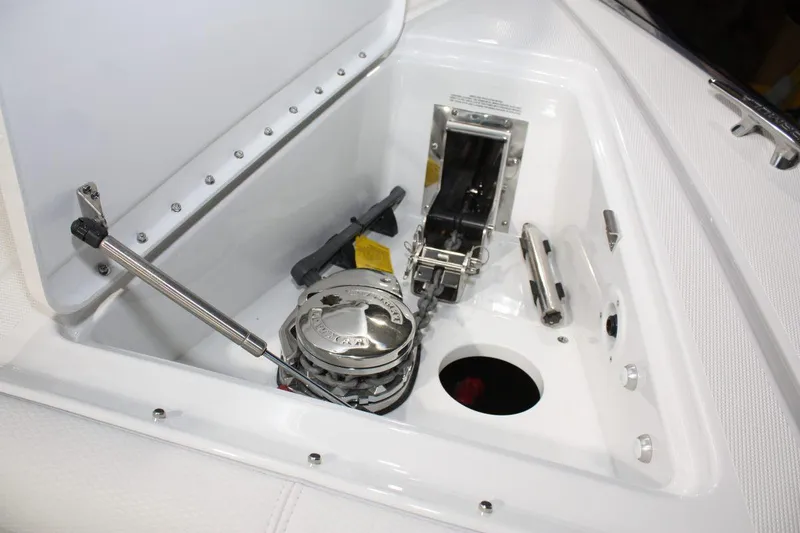 Slide: The Image of 2023 Formula 380 Super Sport Crossover OB anchor locker with winch and storage compartment. - 35