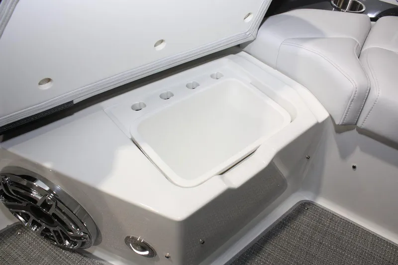 Slide: The Image of 2023 Formula 380 Super Sport Crossover OB interior detail with storage compartment and speaker. - 36