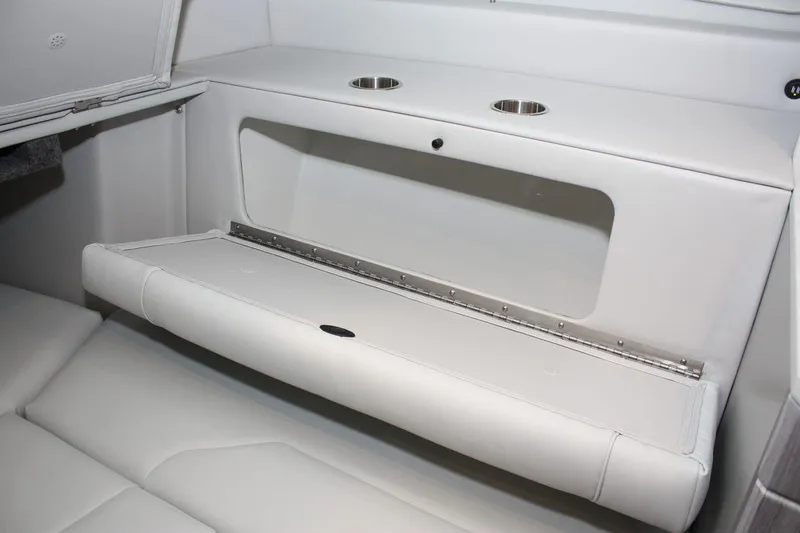 Slide: The Image of 2023 Formula 380 Super Sport Crossover OB interior seating with cup holders. - 48