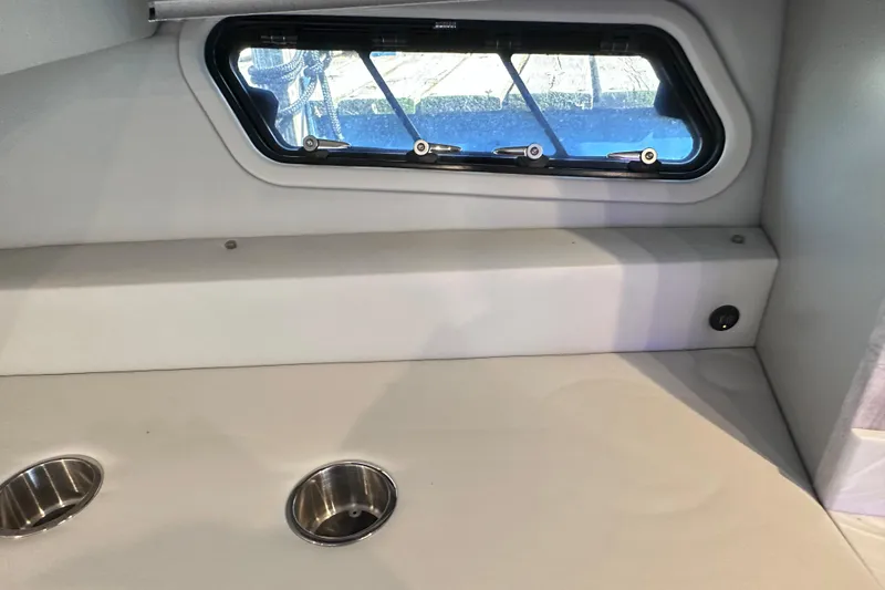 Slide: The Image of Interior of 2023 Formula 380 Super Sport Crossover OB with window and cup holders. - 77