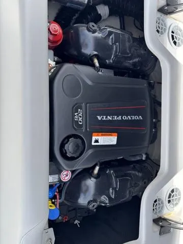 Slide: The Image of 2019 Regal 1900 ES boat engine, featuring a Volvo Penta 200 V6. - 16
