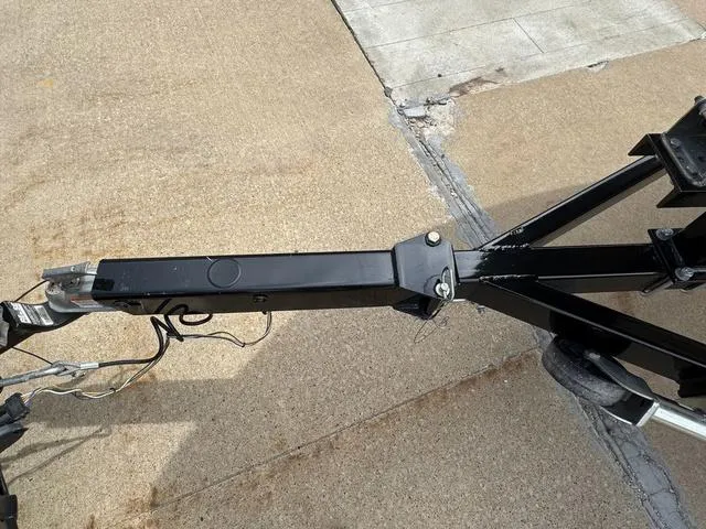 Slide: The Image of Trailer hitch of a 2019 Regal 1900 ES on a concrete surface. - 18