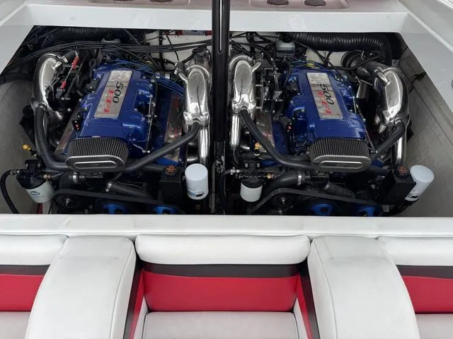 Slide: The Image of Twin engines in a 2000 Baja 36 Outlaw boat, showcasing powerful performance. - 10