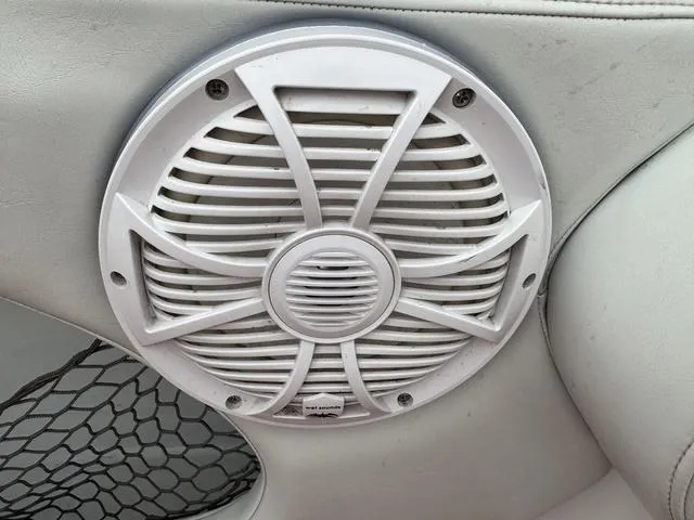 Slide: The Image of White speaker on a 2000 Baja 36 Outlaw boat interior. - 16
