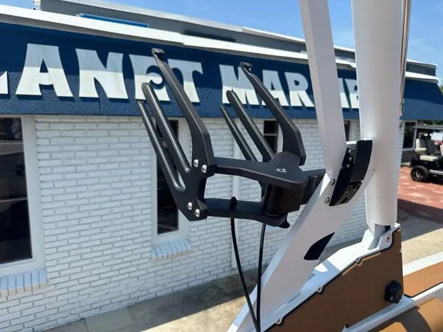 Slide: The Image of 2025 Axis Wake Research T Series T220 boat accessory near marine store. - 14