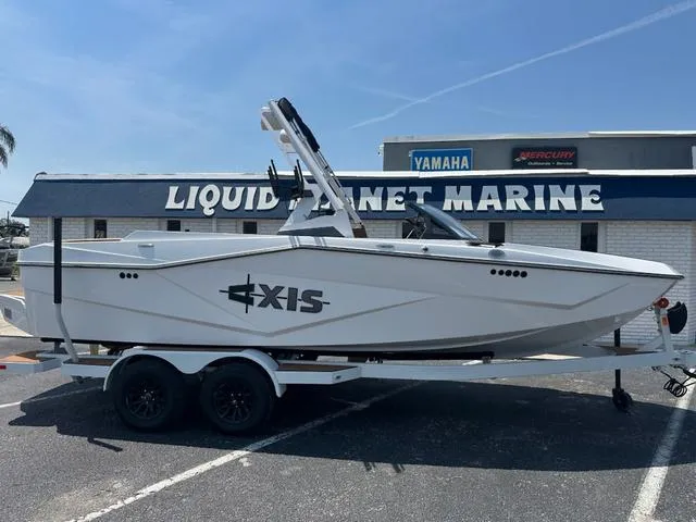 Slide: The Image of 2025 Axis Wake Research T Series T220 boat at Liquid Planet Marine dealership. - 3