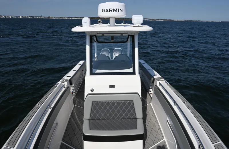 Slide: The Image of 2022 Drakkar 280 CC boat with Garmin equipment on open water. - 11