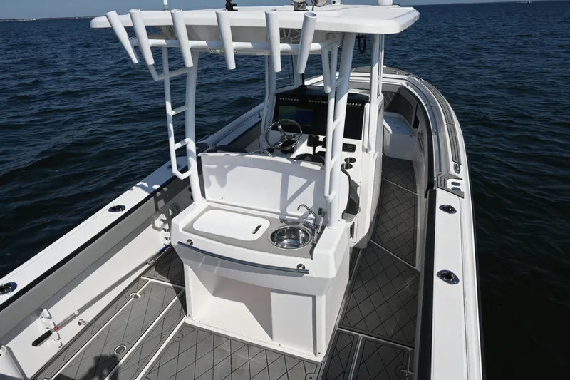 Slide: The Image of 2022 Drakkar 280 CC boat with sleek design on open water. - 39