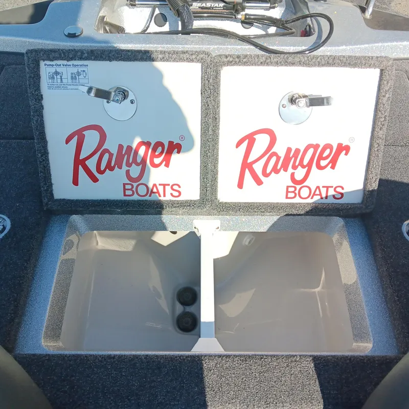 Slide: The Image of Ranger Z185 2025 boat livewell with dual compartments and branding. - 18