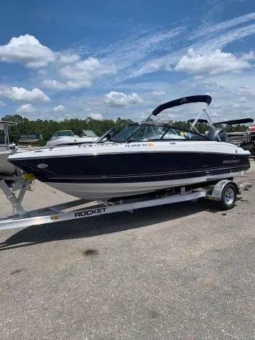 Slide: The Image of 2017 Monterey 197 Outboard boat on trailer under blue sky. - 6